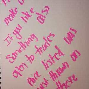 Pink Handwritten Notes on White Paper